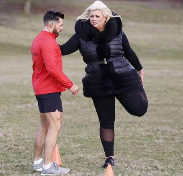 Gemma is working out with her personal trainer